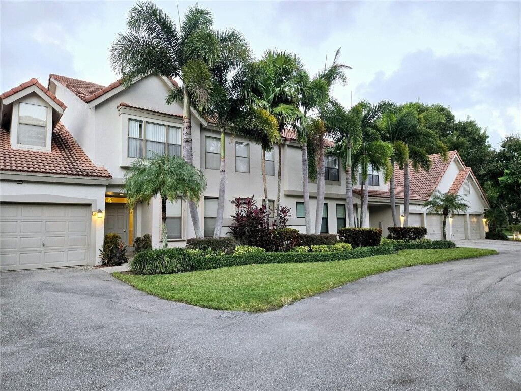 Property Photo:  5771 Coach House Circle  FL 33486 