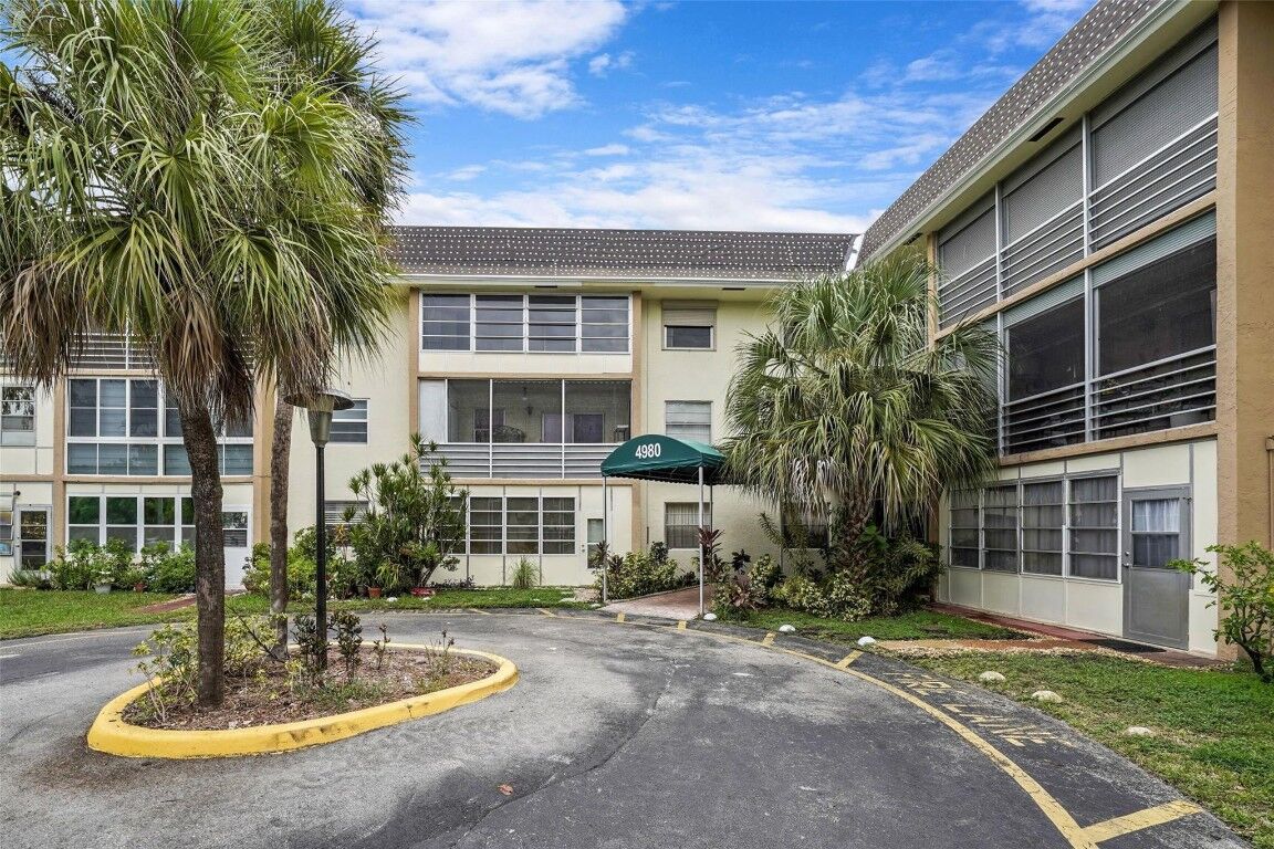 Property Photo:  4980 E Sabal Palm Boulevard 330  FL 33319 