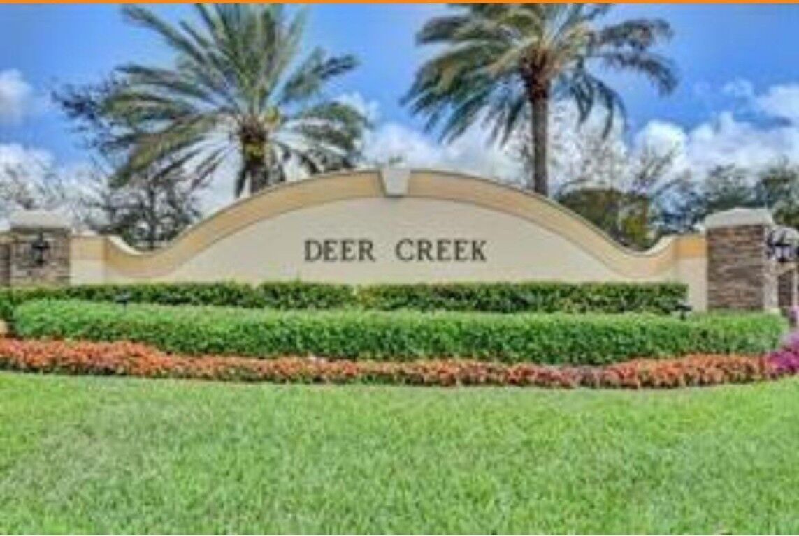 Property Photo:  2410 Deer Creek Country Club Boulevard 202  FL 33442 