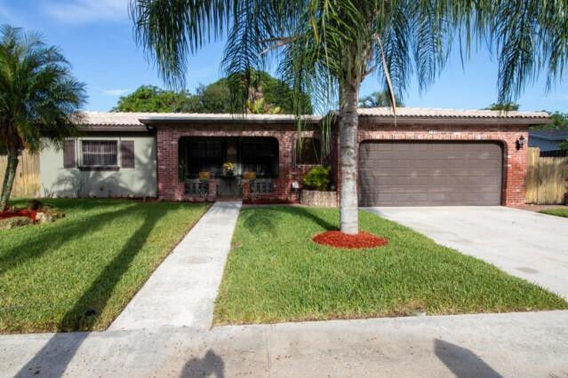 Property Photo:  149 NW 77th Avenue  FL 33063 