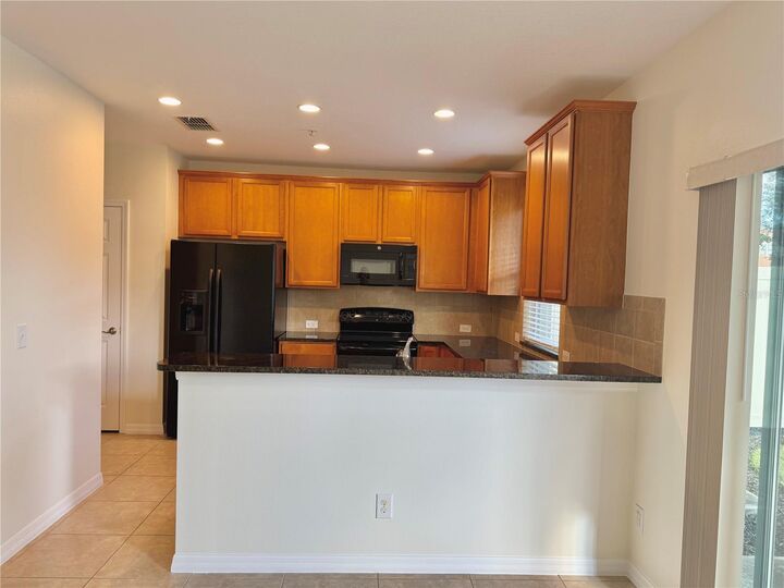 Property Photo: 2090 Water Tupelo Way FL 34761