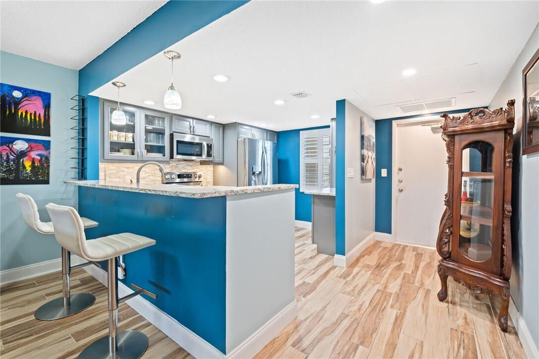 Property Photo:  575 Oaks Lane 406  FL 33069 