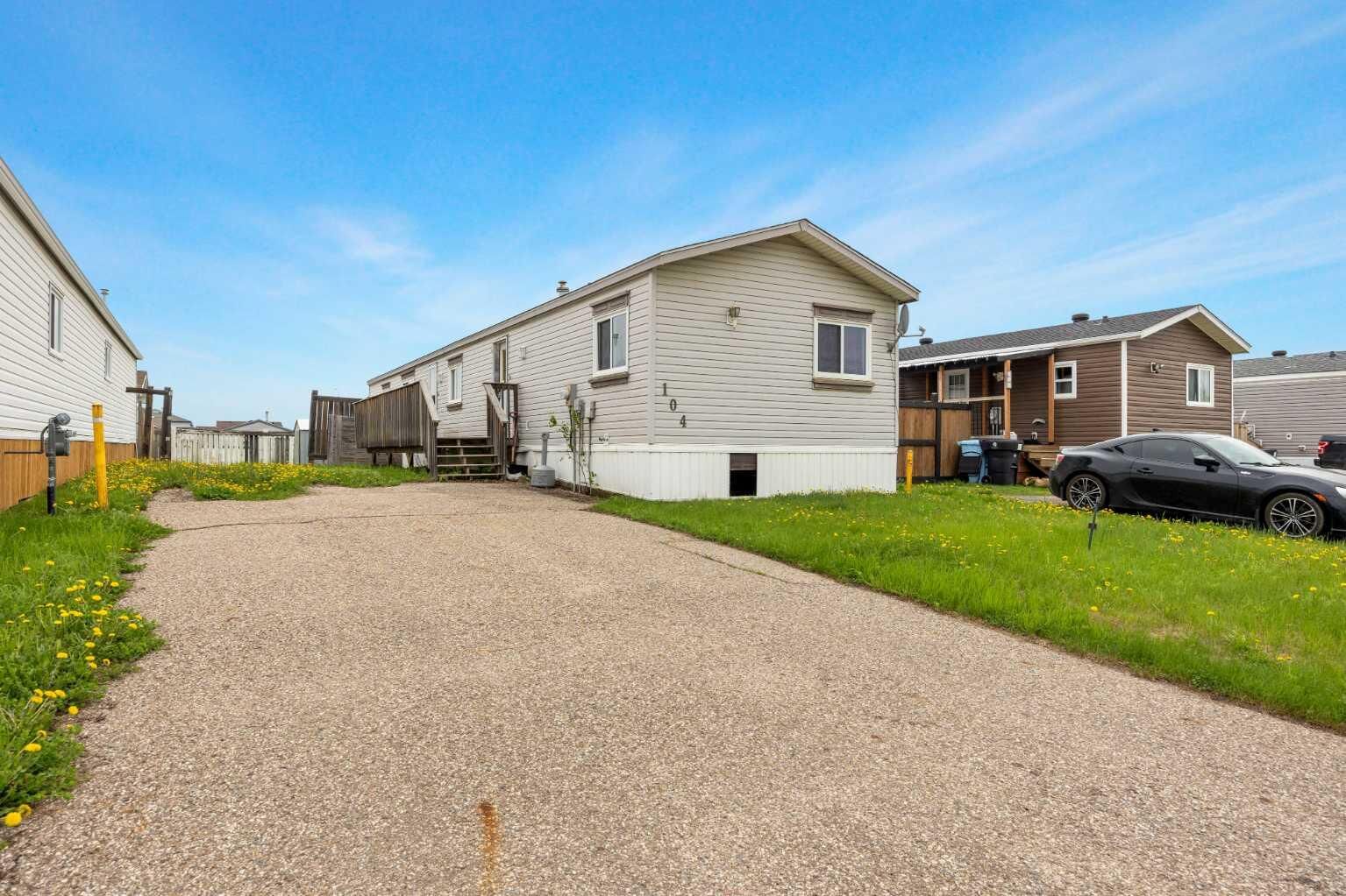 Property Photo:  104 Cree Road  AB T9K 1X3 