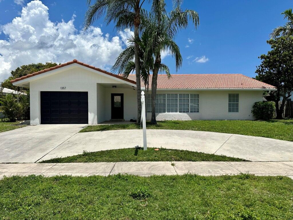 Property Photo: 1357 NW 14th Court FL 33486