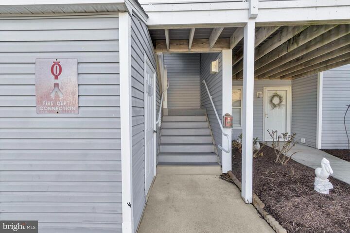 Property Photo:  30380 Crowley Drive 411  DE 19970 