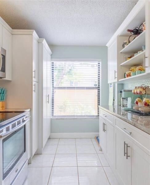 Property Photo:  1424 NW 97th Ter 280  FL 33024 