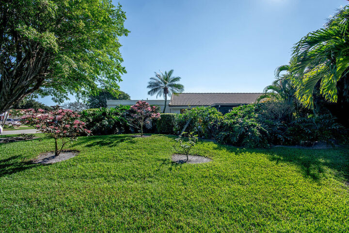 Property Photo:  5570 Piping Rock Drive  FL 33437 
