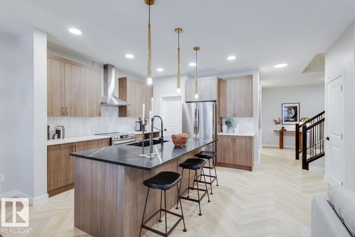 Property Photo:  4136 208 Street NW  AB T6M 3E4 