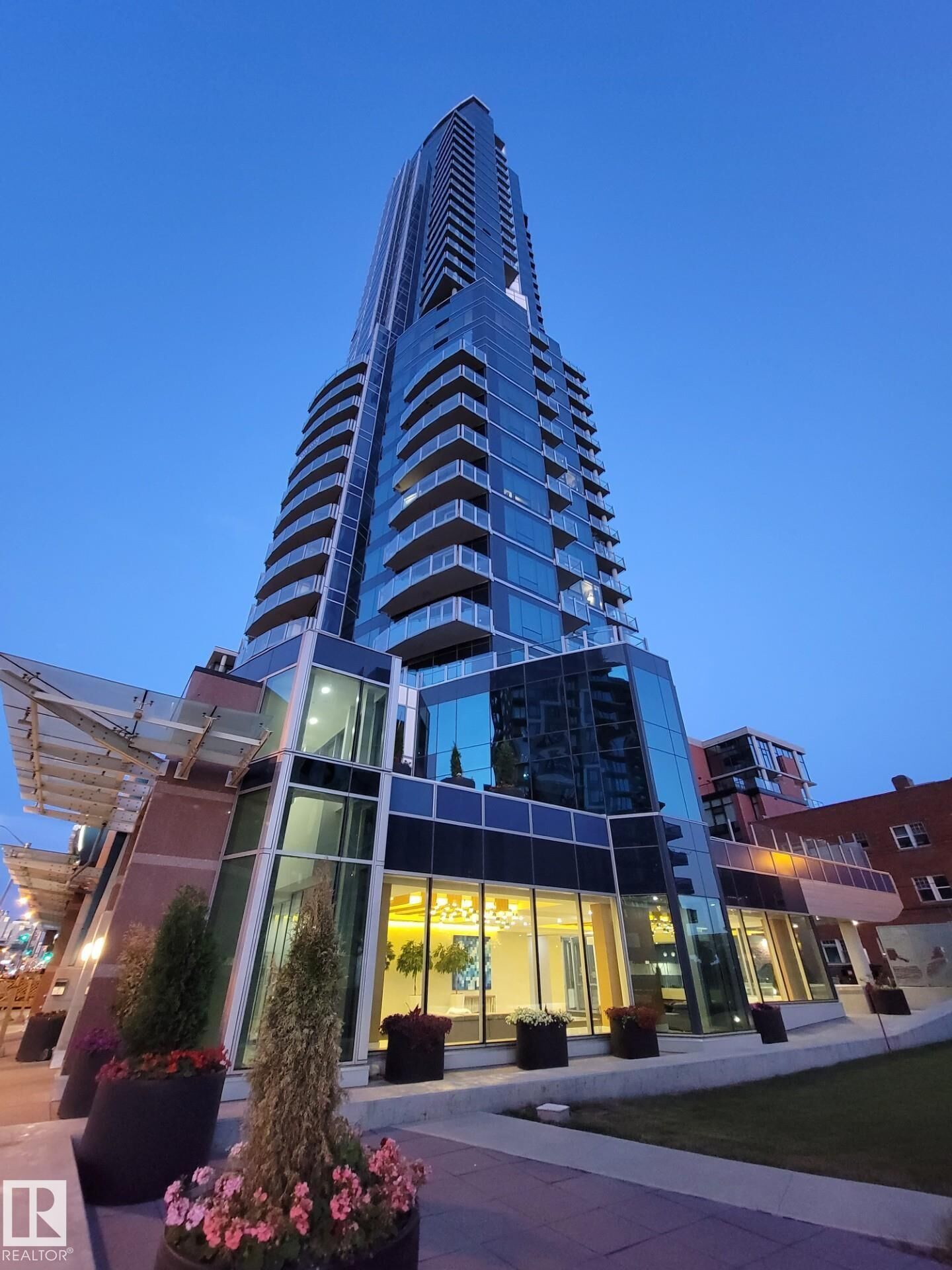 Property Photo: 11969 Jasper Avenue NW 1403 AB T5K 0P1