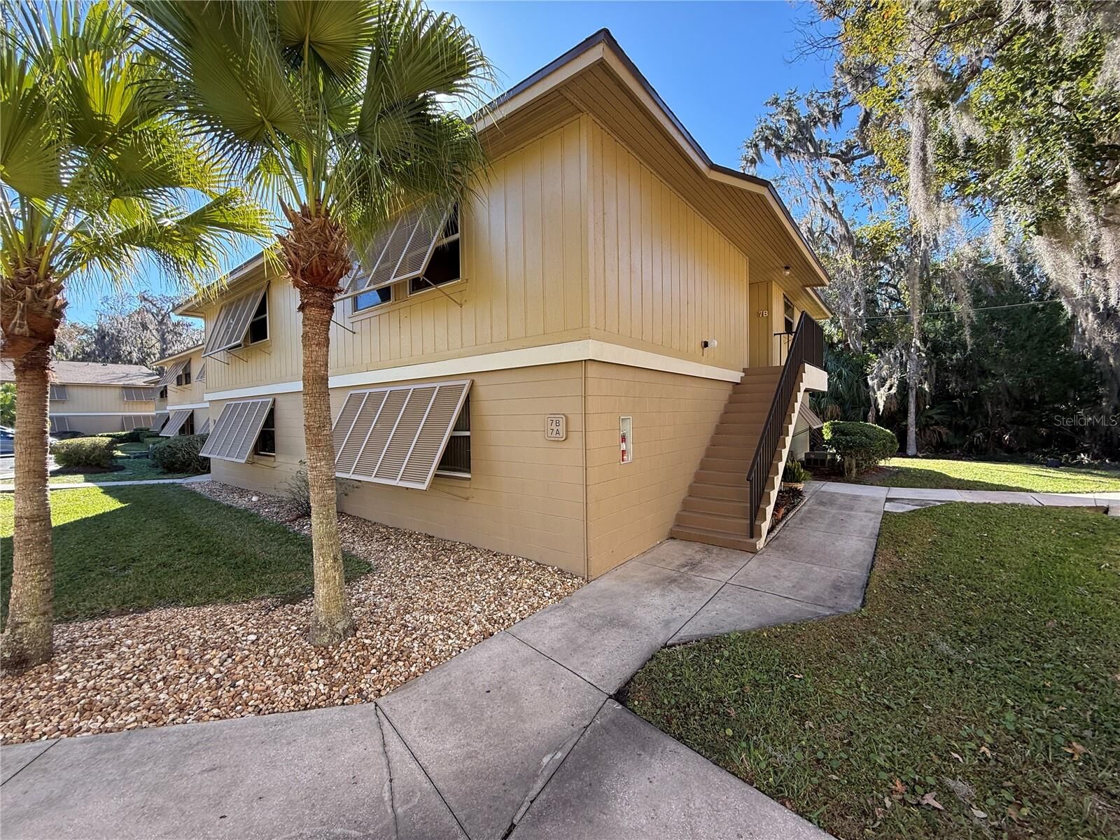 Property Photo:  130 Jasmine Woods Court 7B  FL 32725 