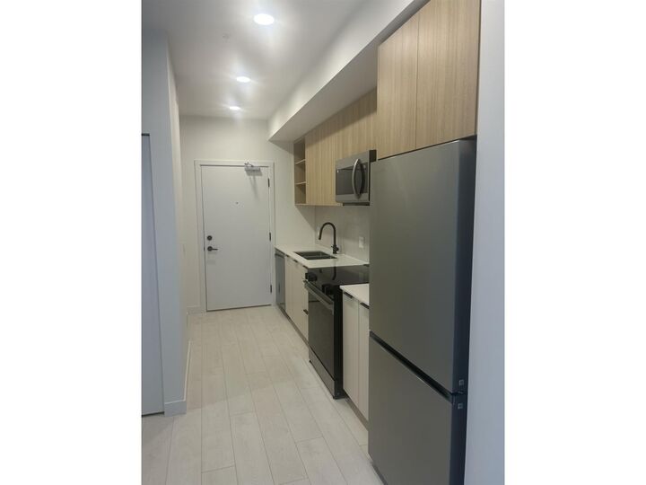 Property Photo: 13439 94A Avenue 402 BC V3V 0G9