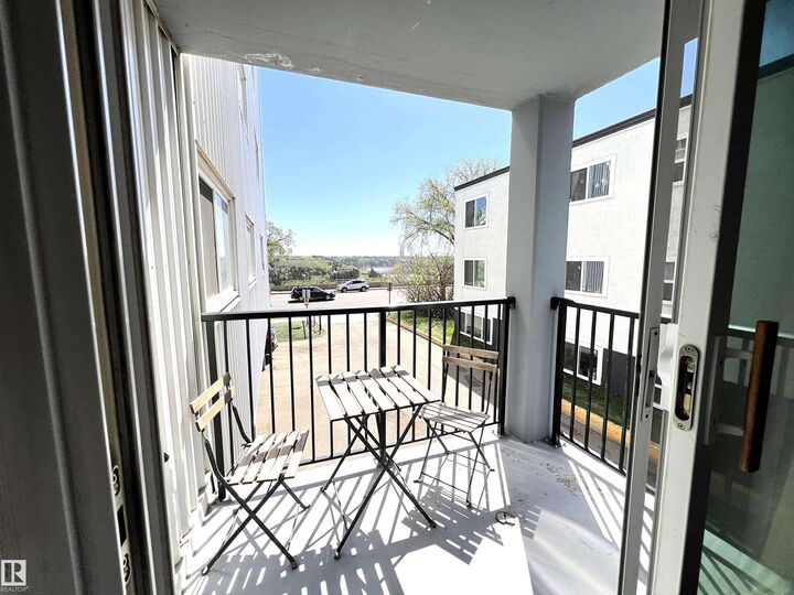 Property Photo:  8310 Jasper Avenue NW 103  AB T5H 3S3 