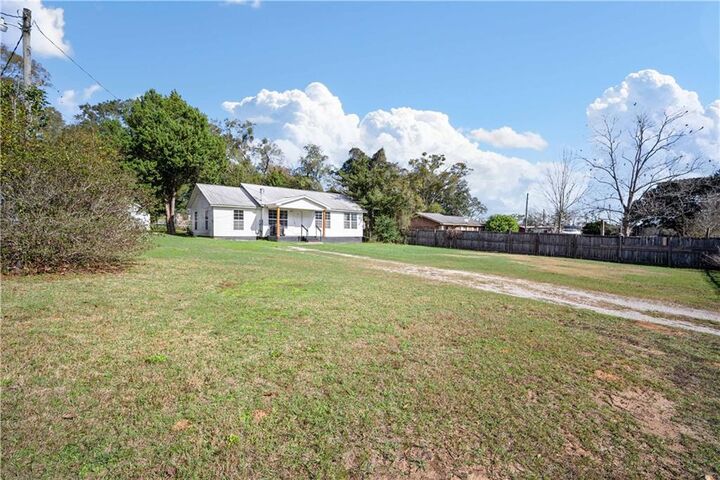 Property Photo:  7500 Deakle Road  AL 36544 