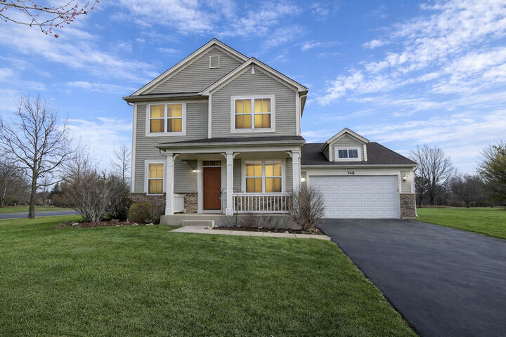 Property Photo:  748 Versailles Parkway  IL 60543 