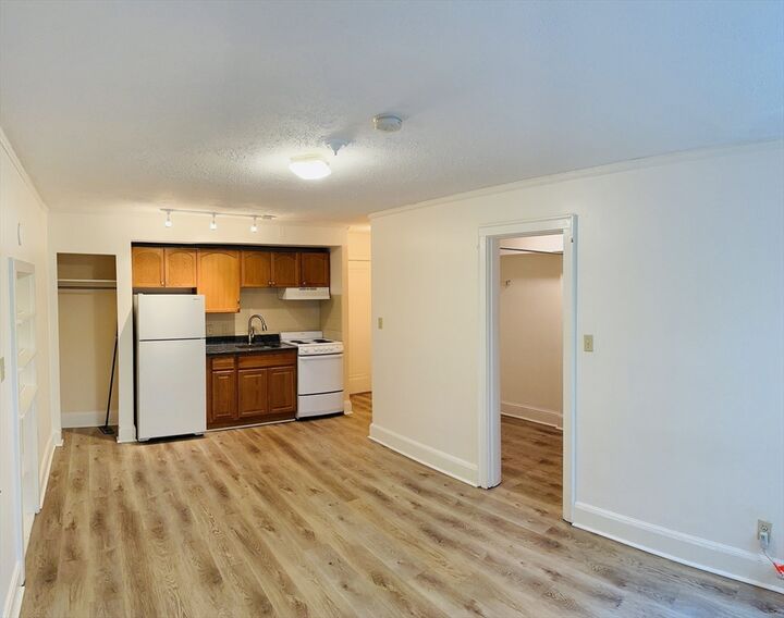 Property Photo:  195 Thomas Burgin Parkway 212  MA 02169 