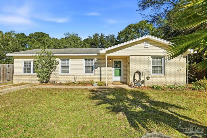 Property Photo:  6444 Walnut St  FL 32570 