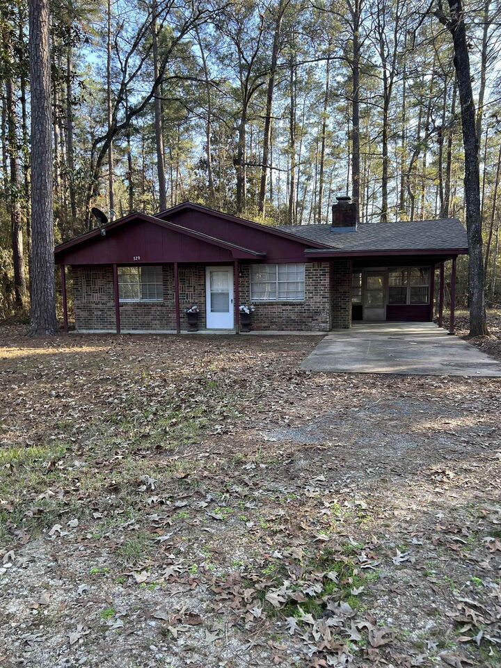 Property Photo: 329 Blue Willow TX 77663