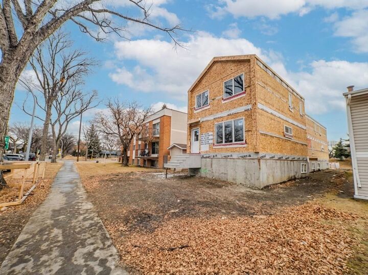 Property Photo:  11939  101 Street  AB T5G 2B8 