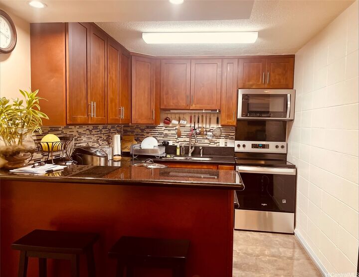 Property Photo:  94-99 Waipahu Street A308  HI 96797 