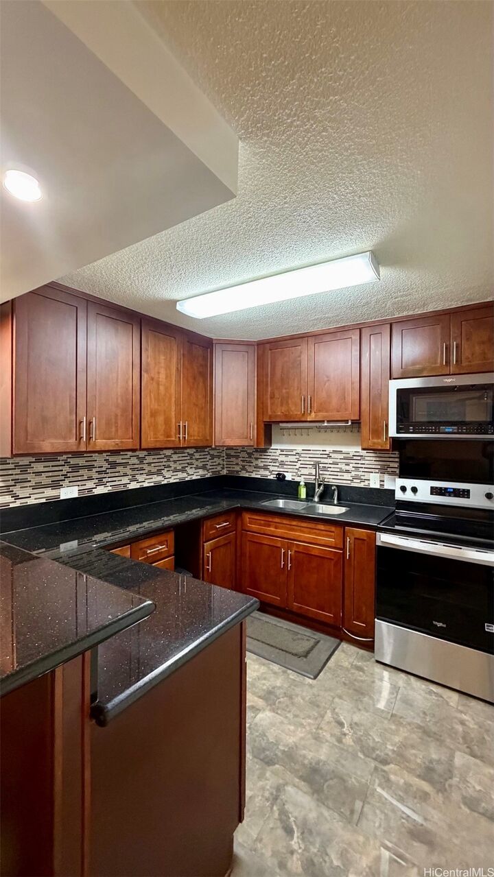 Property Photo:  94-99 Waipahu Street A308  HI 96797 