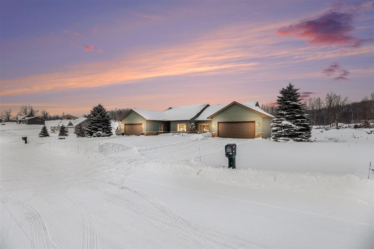 Property Photo:  903 Windsong  MI 49770 