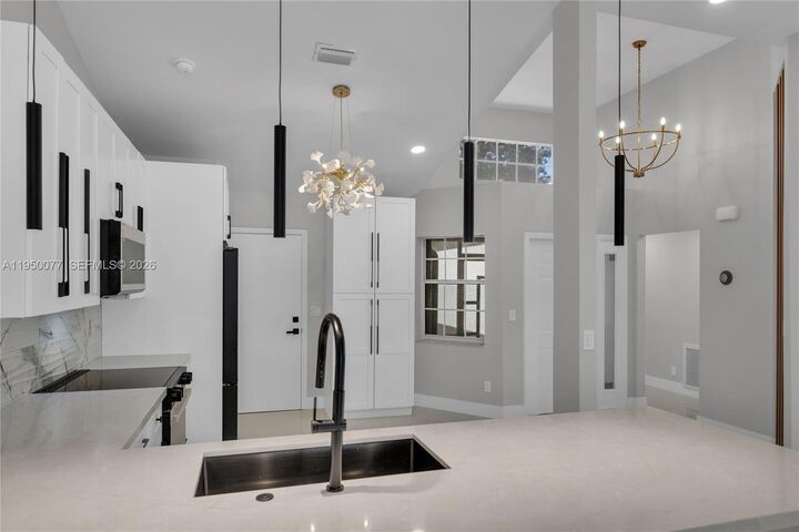 Property Photo: 7889 Lake Sands Dr FL 33446