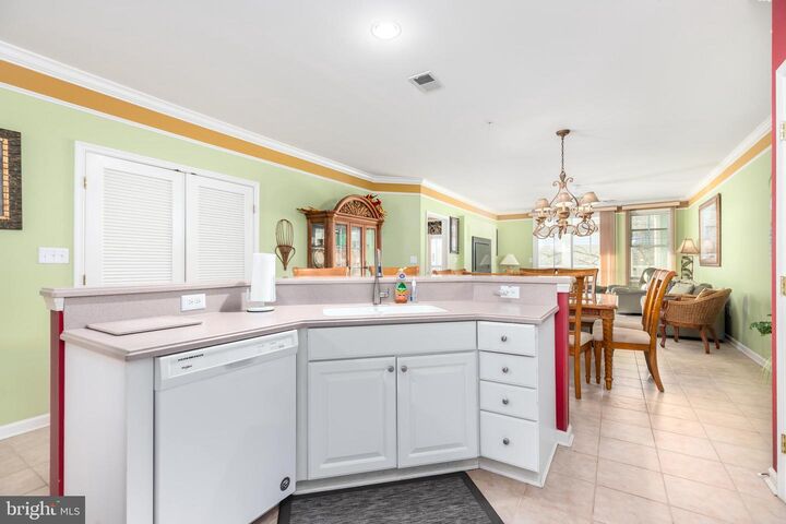 Property Photo:  2 Fountain Drive E 2B  MD 21842 