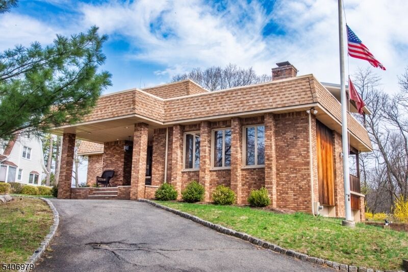 Property Photo:  845 Rifle Camp Rd  NJ 07424 