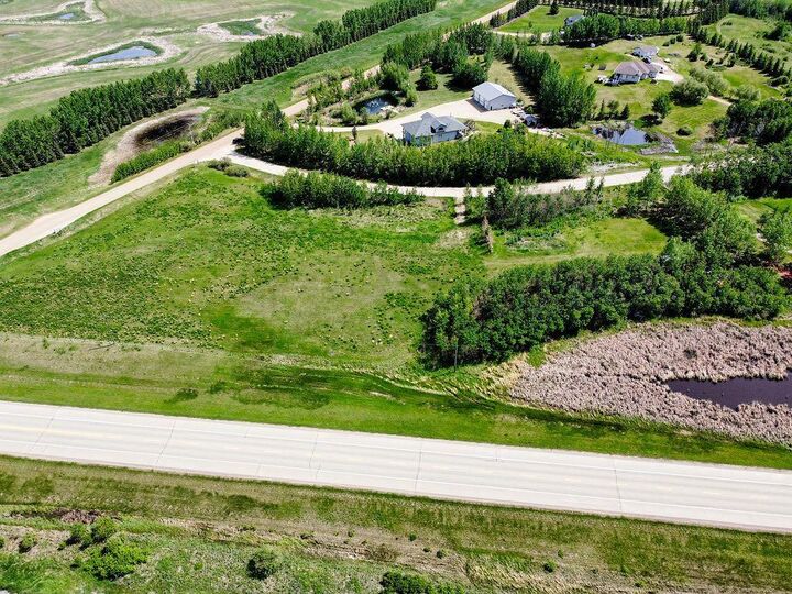 Property Photo: 46520 Range Road 213 102 AB T0C 0L0