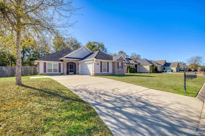 Property Photo:  7329 Farmers Rd  FL 32526 