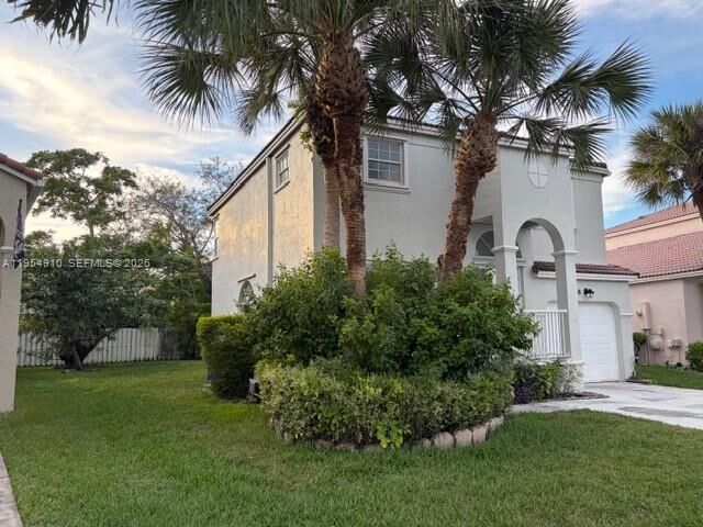 Property Photo:  318 NW 153rd Ave  FL 33028 