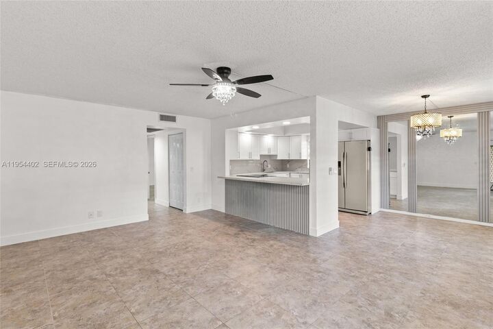 Property Photo:  850 SW 133rd Ter 118B  FL 33027 