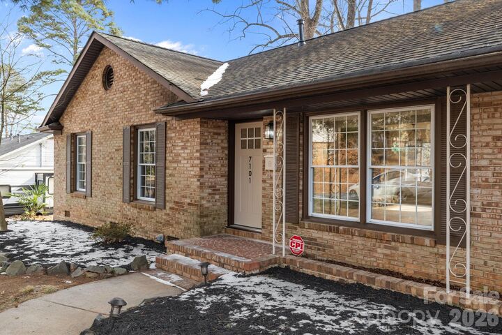 Property Photo:  7101 Woodstock Drive  NC 28210 