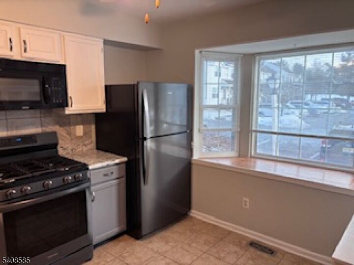 Property Photo:  1004 Wetherburn Ct  NJ 08822 