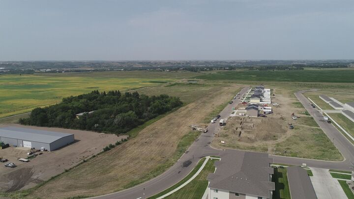 Property Photo: 2025 & 2027 35th St NW ND 58703