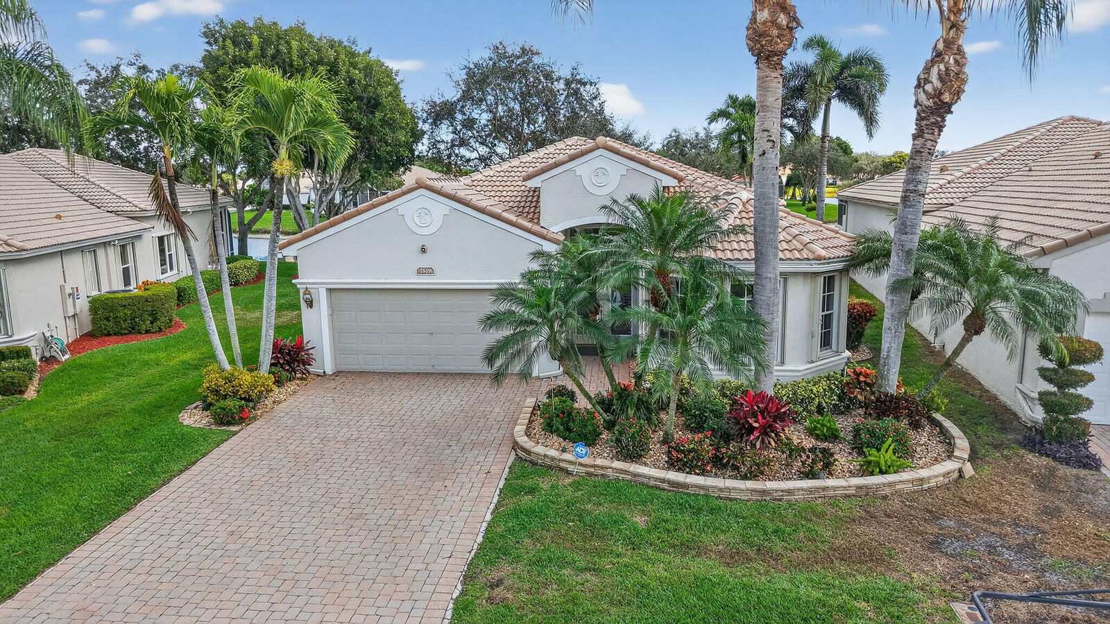 Property Photo:  7819 Lando Avenue  FL 33437 