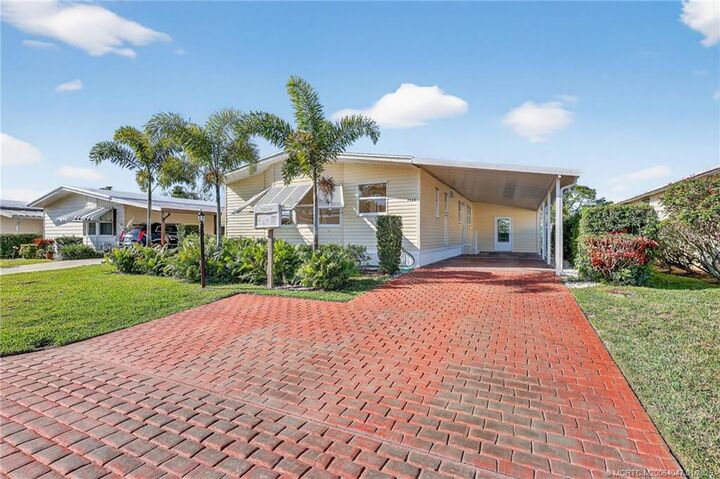 Property Photo:  7924 SE Saratoga Drive  FL 33455 