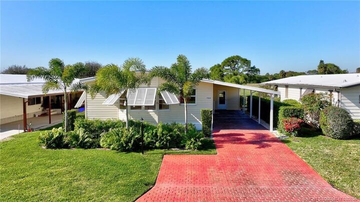 Property Photo:  7924 SE Saratoga Drive  FL 33455 