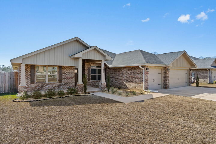 Property Photo:  5823 Crestlake Drive  FL 32536 