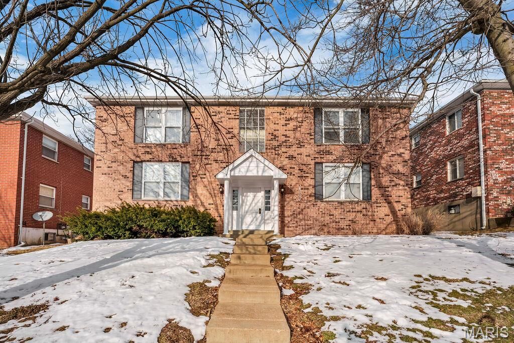 Property Photo:  10045 Puttington Drive Unit C  MO 63123 