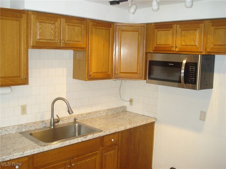 Property Photo:  902 E 207th Street  OH 44119 