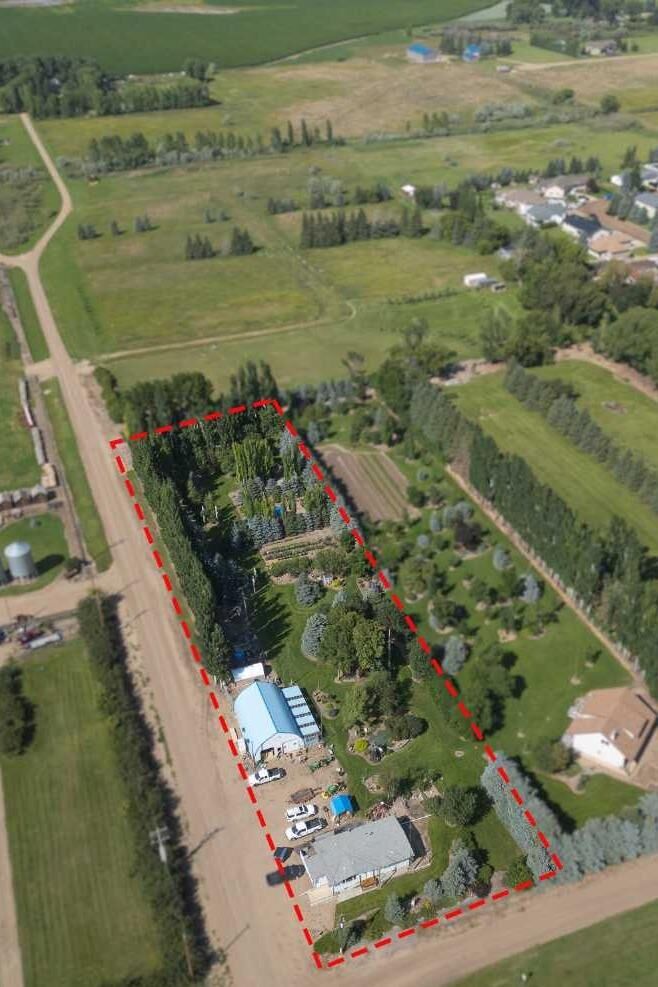 Property Photo: 145006 Cassils Road 146 AB T1R 1B4