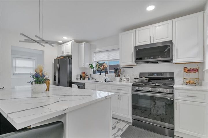 Property Photo:  215 Kenyon Avenue  RI 02861 