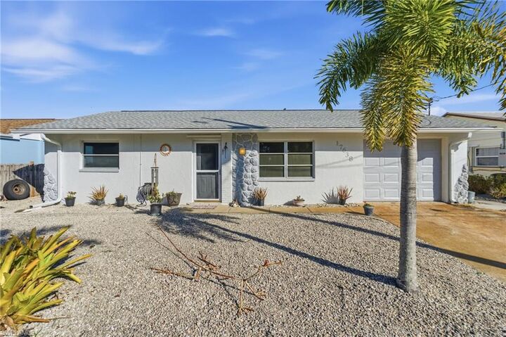 Property Photo:  17638 Corallina Dr  FL 33991 