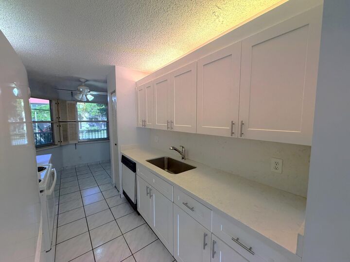 Property Photo: 1200 SW 130th Avenue 210-G FL 33027