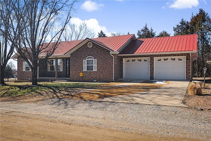 Property Photo:  303 W Robin Trail  AR 72644 