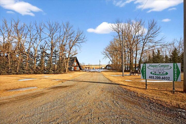 Property Photo: 241037 Rge Rd 241 AB T1P 2C3