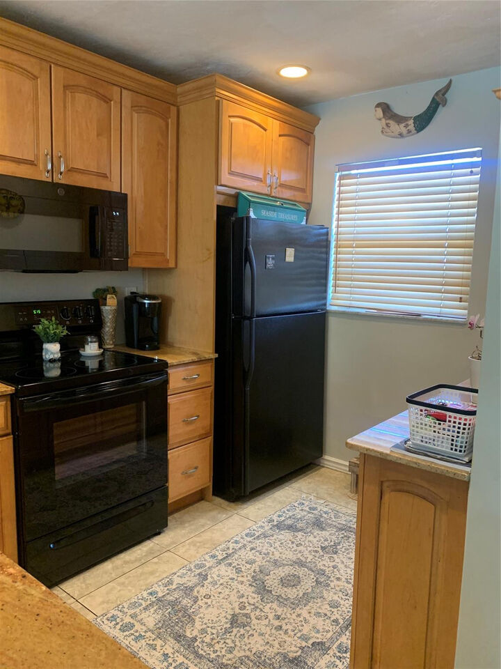 Property Photo:  1400 NE 57th Street 302  FL 33334 