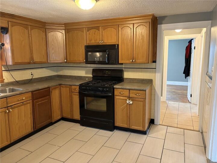 Property Photo:  610 Killingly Street 1  RI 02919 