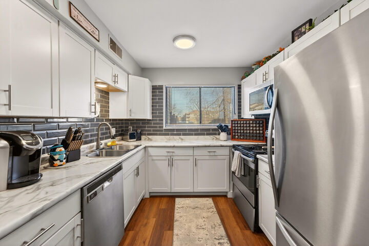 Property Photo:  8305 N 107th St F  WI 53224 